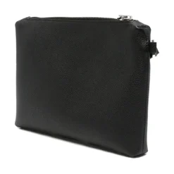 Clutch med håndleddsstropp i granulert skinn