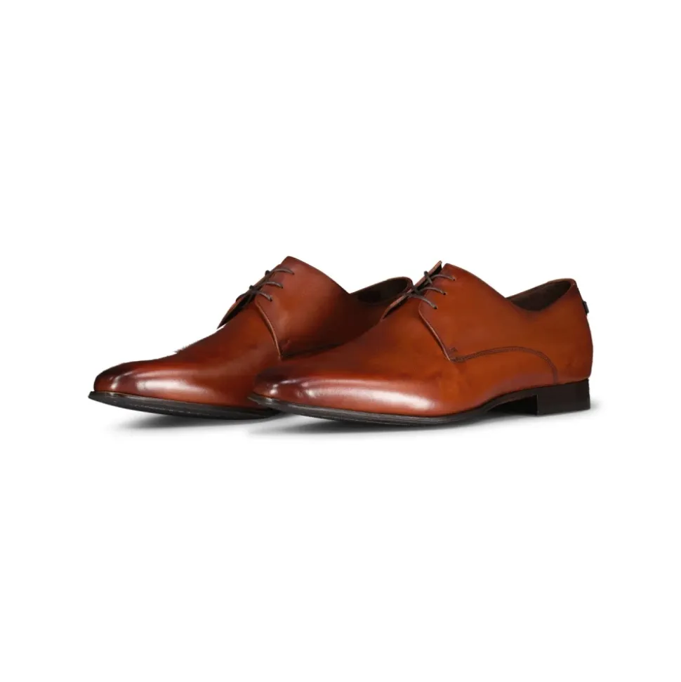 Klassiske skinnende snøresko