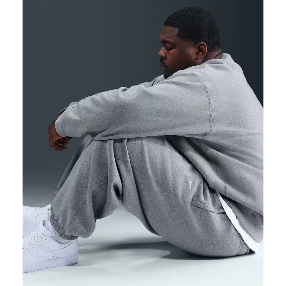 Solo Swoosh Cuffed Fleece Pants