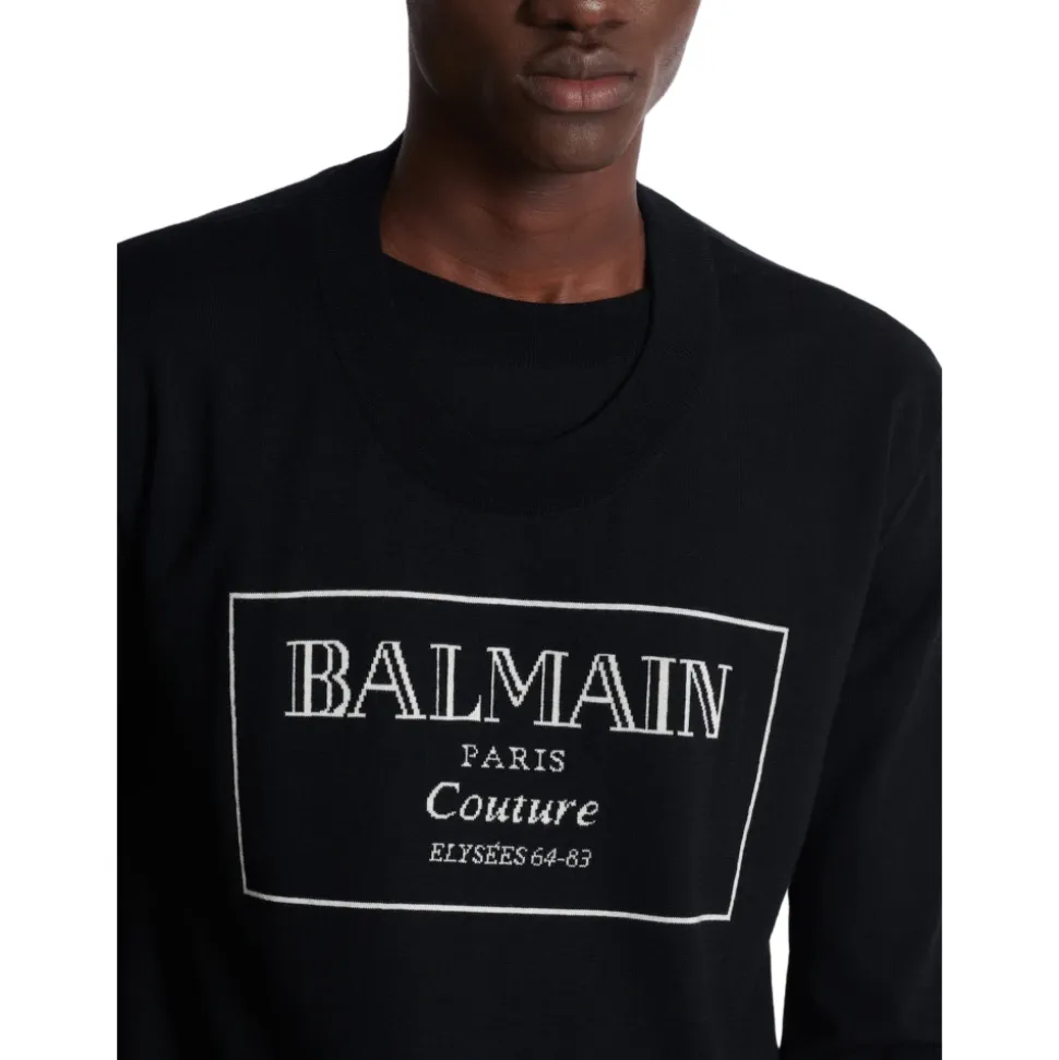 Strikket genser med Couture-etikett